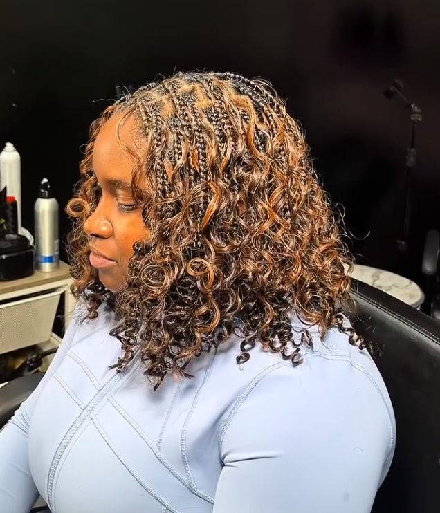 Shoulder-length highlighted French curls